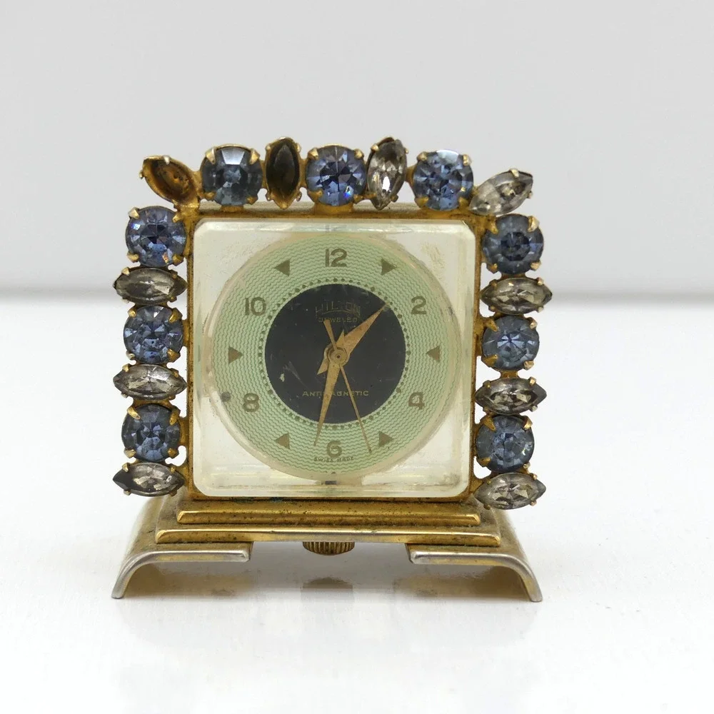 VTG Hilton Jeweled Antimagnetic Mini Skeleton Desk Clock Gold Tone Swiss Quartz
